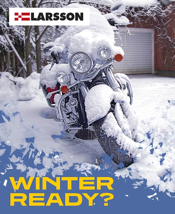 Harley Davidson covered in snow